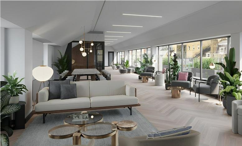 Bright open-plan lounge with white sofas, potted plants, and floor-to-ceiling windows.