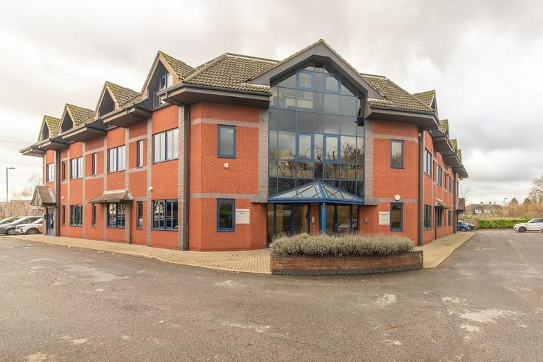 Exterior view of the brick and glass facade at Heritage Gate, East Point Business Park.