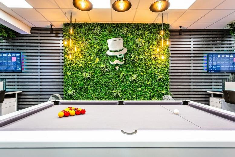 Spacious communal area at HiveTree, 9 Bigg Market, Central Buildings, Newcastle featuring a grey pool table.