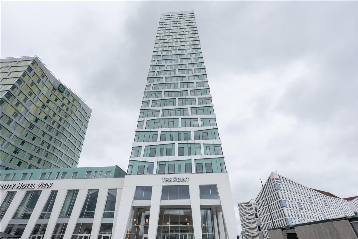 Exterior view of the soaring modern glass skyscraper at Hyllie Stationstorg 31.