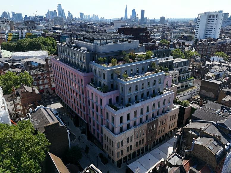 Aerial view of the colorful stepped facade at Ilona Rose House in London.