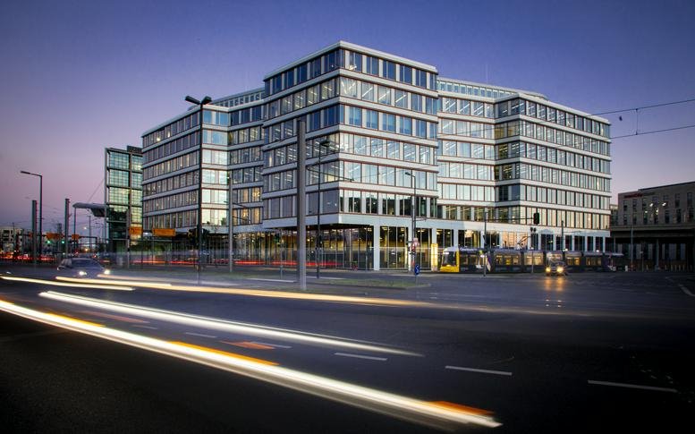 Exterior view of the contemporary glass-facade building at Invalidenstr. 65, Berlin.
