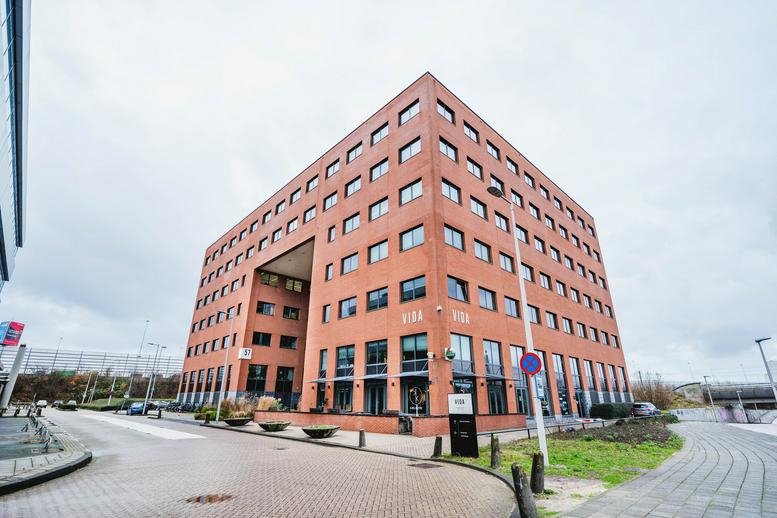 Exterior view of the brick facade at Kabelweg 57, Amsterdam, North Holland.