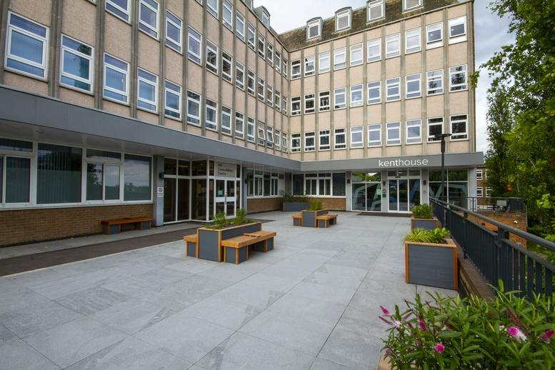 Exterior view of Kent House, 81 Station Road, Ashford, showing its multi-story facade and courtyard.