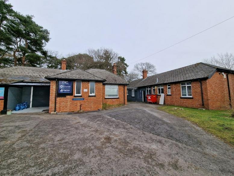 Exterior view of the brick-built office buildings on Kildare Road, Bordon, Hampshire.