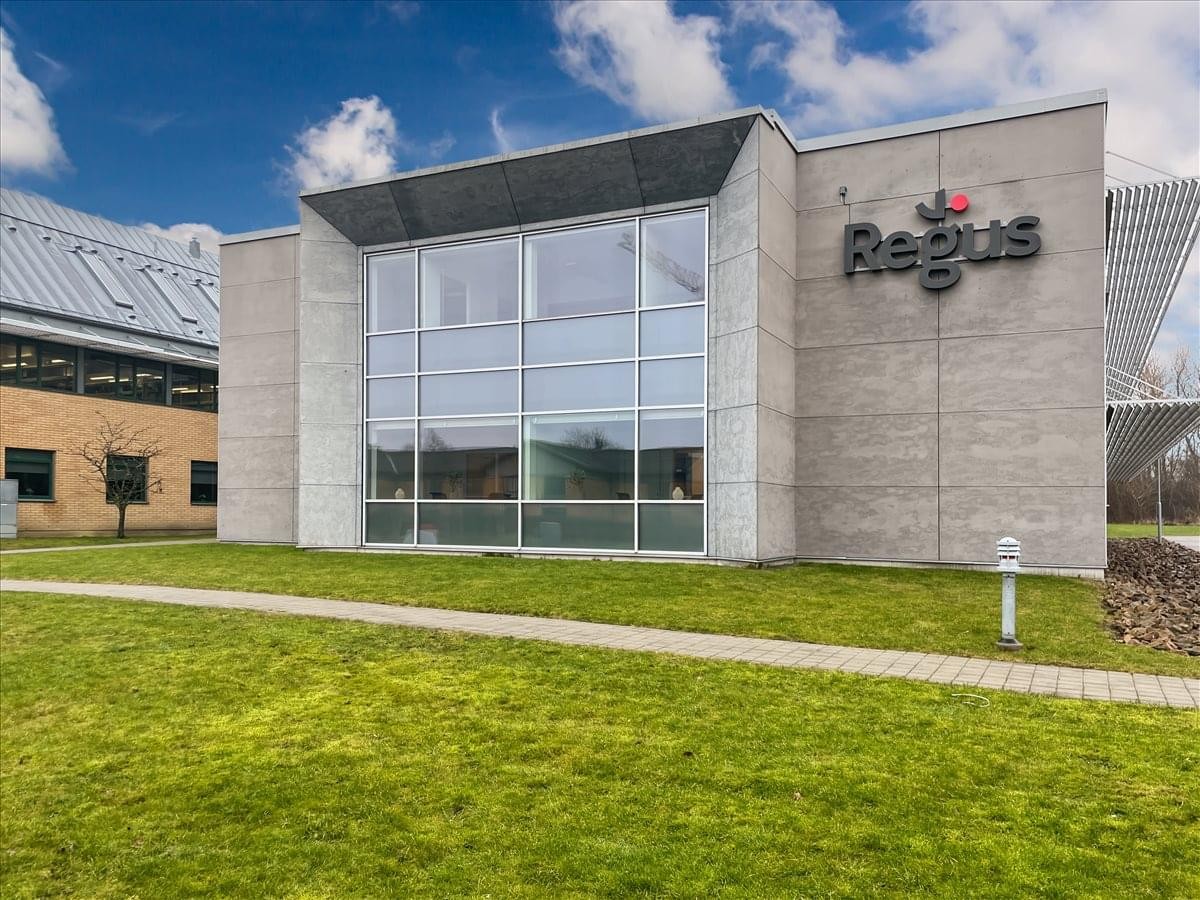 Exterior view of the modern grey stone and glass building at Klosterängsvägen 11 A, Ground Floor, Lund.