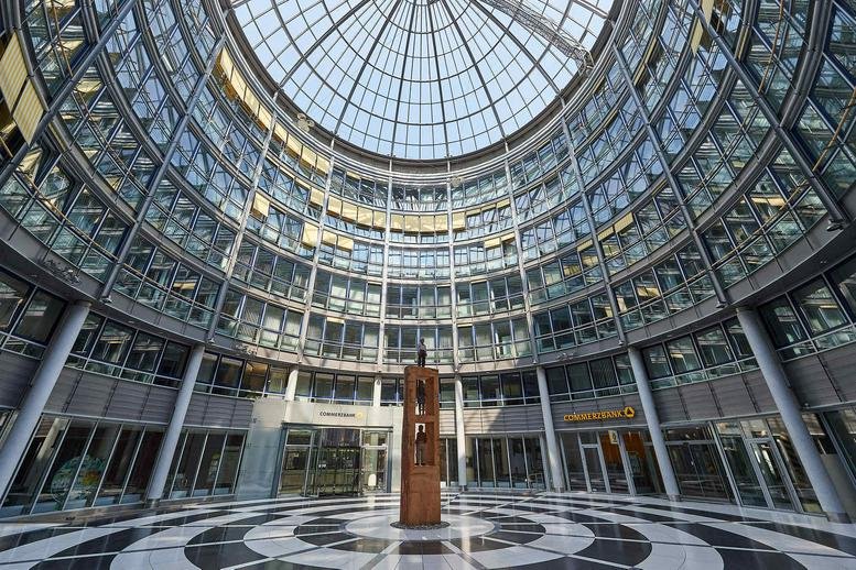 Dramatic circular glass atrium and lobby at Koppenstraße 93.