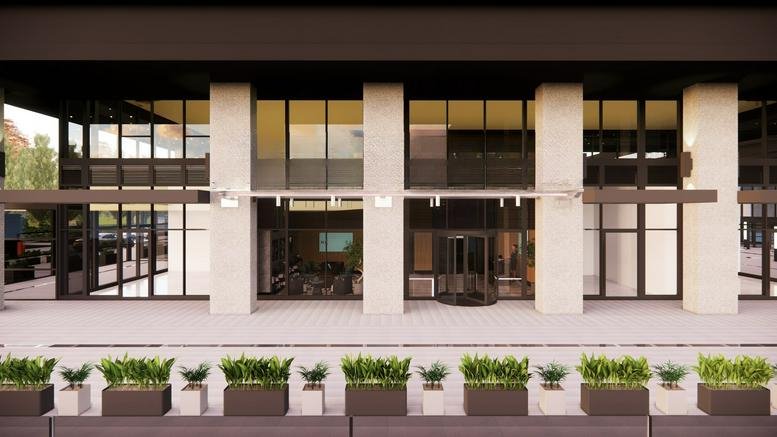 Exterior view of the modern stone and glass facade of Nidya Center, Istanbul.