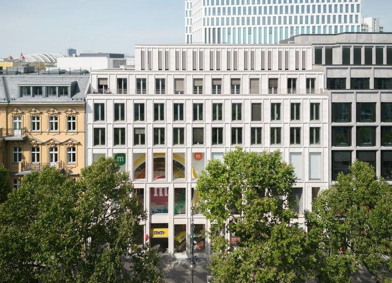 Exterior view of the light stone facade at Kurfürstendamm 14, Berlin, Brandenburg.