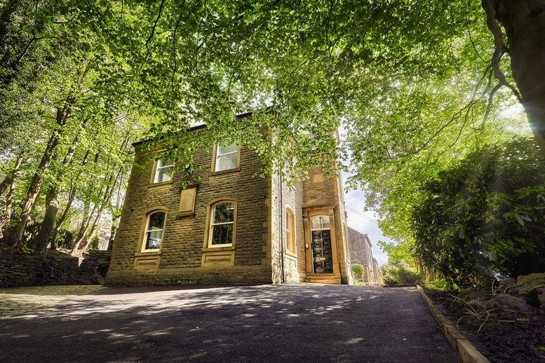 Exterior view of the stone building at Lewisham Road, Slaithwaite, Huddersfield, West Yorkshire.