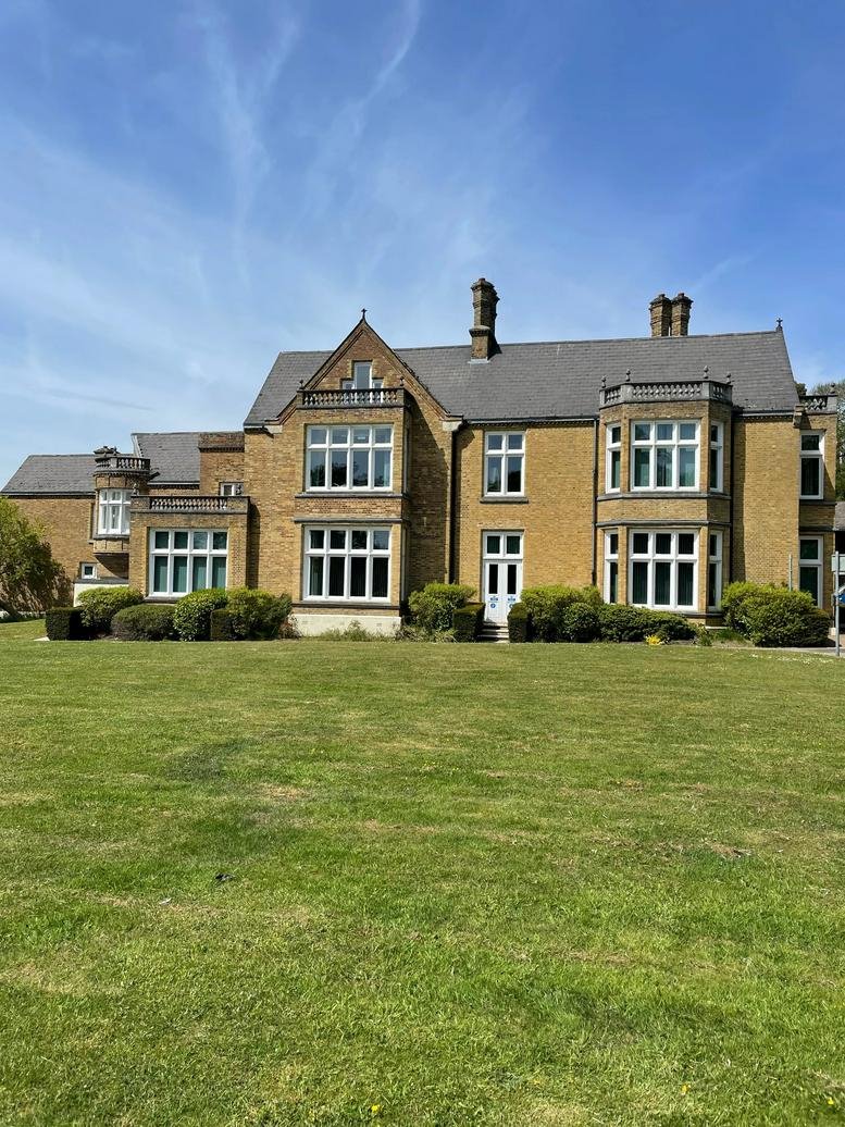 Exterior view of the historic brick facade at Lily Hill House.