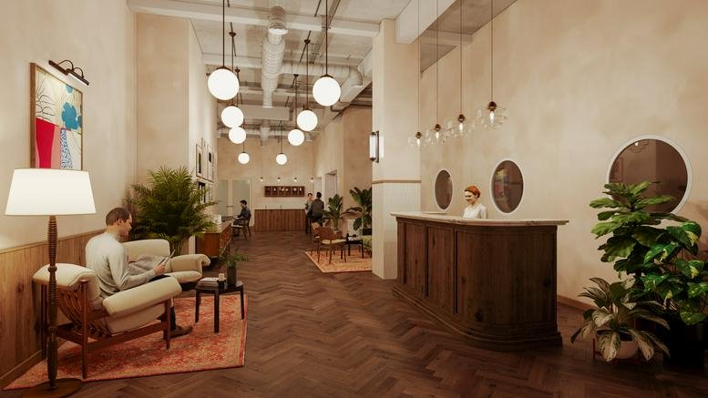Warm, spacious reception and lobby at Münzstraße 12, Berlin, Brandenburg with wood panelling and sphere pendant lights.