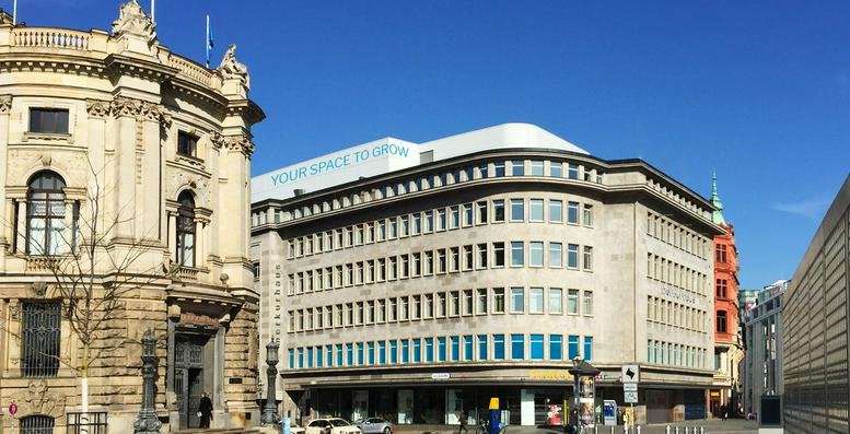 Exterior view of the historic facade and modern wing at Markgrafenstraße 2, Leipzig, Saxony.