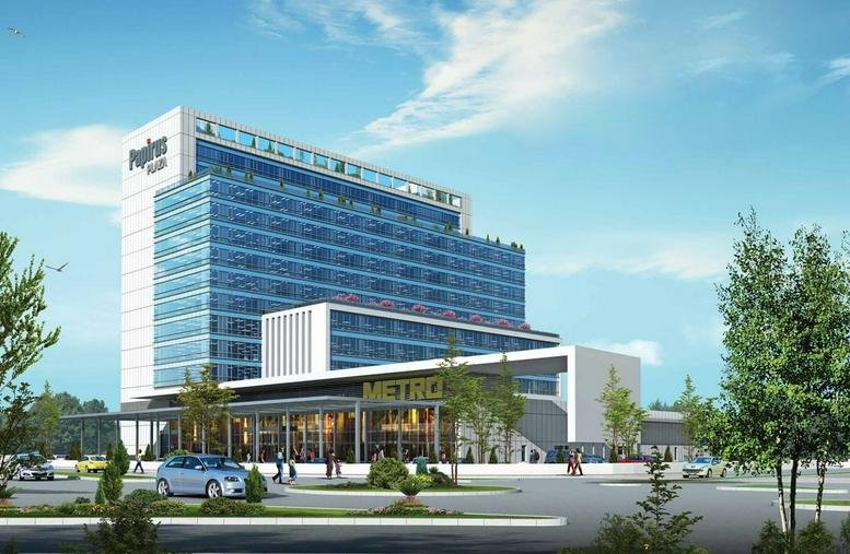 Exterior view of the contemporary multi-story Papirus Plaza building with its glass facade and landscaped entrance.