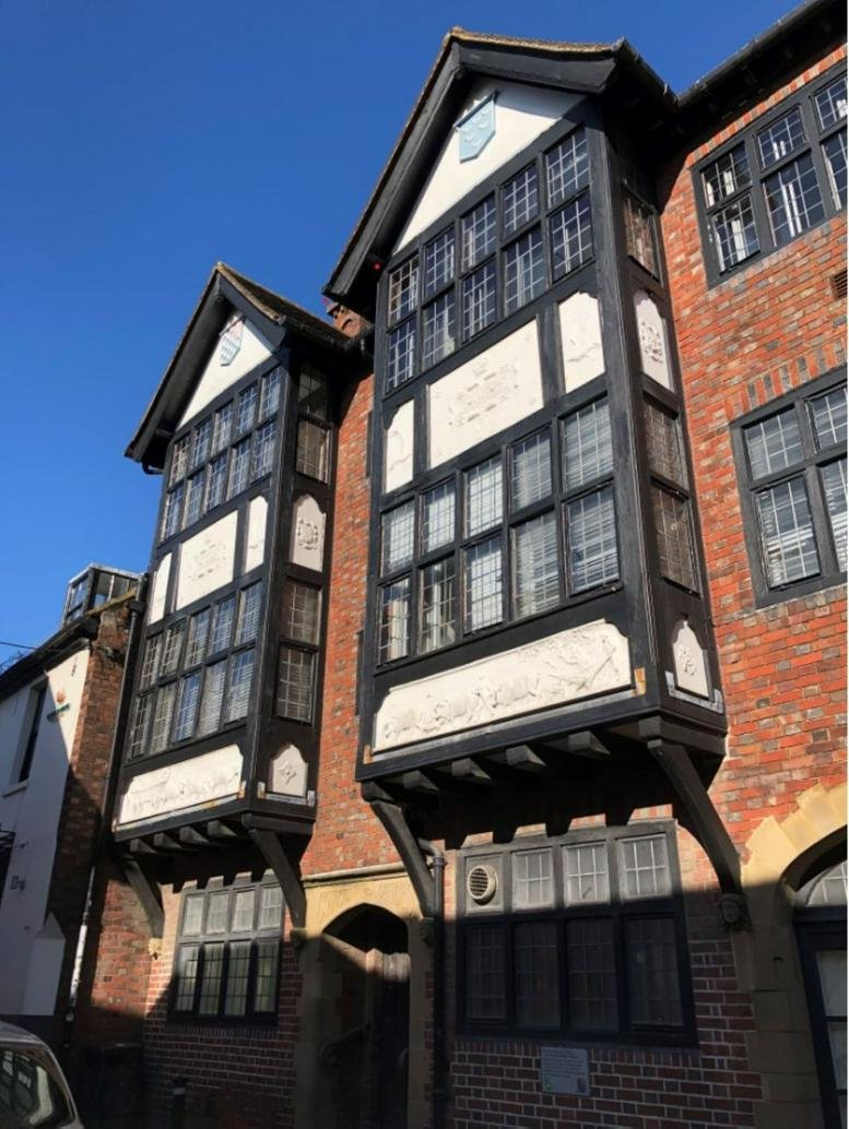 Exterior of the historic timber-framed and brick building at Netwerks, 4 Fisher Street, Lewes.