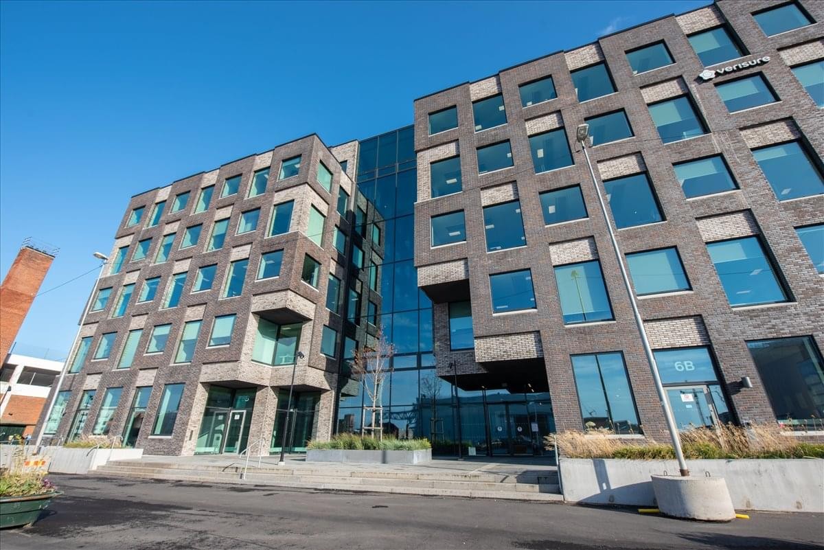 Modern multi-story brick and glass exterior at Nordenskiöldsgatan 11, Malmo.