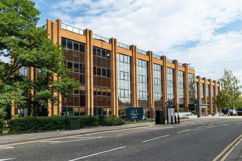 Exterior view of the brick and glass facade at Northminster House, Peterborough.