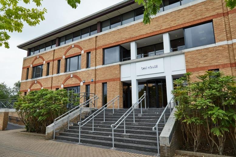 Exterior view of the brick-facade Oak House, Reeds Crescent, Watford with front stairs.