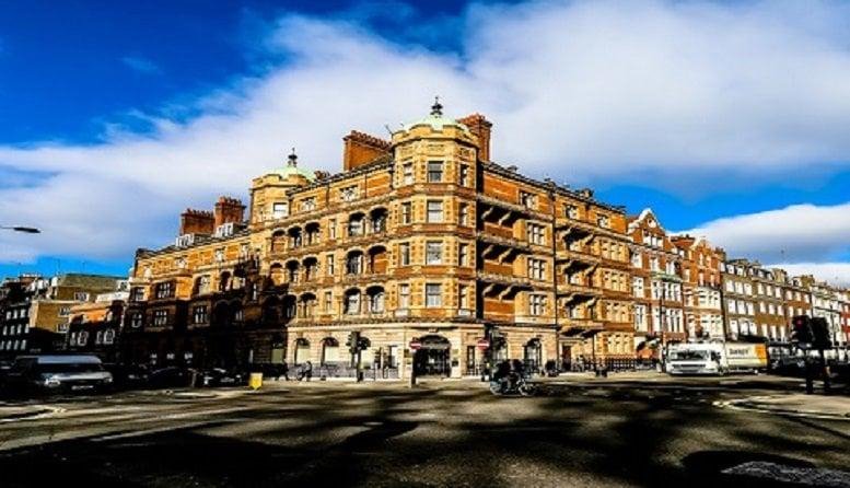 Exterior view of the ornate red brick and stone facade at 1-7 Harley Street.