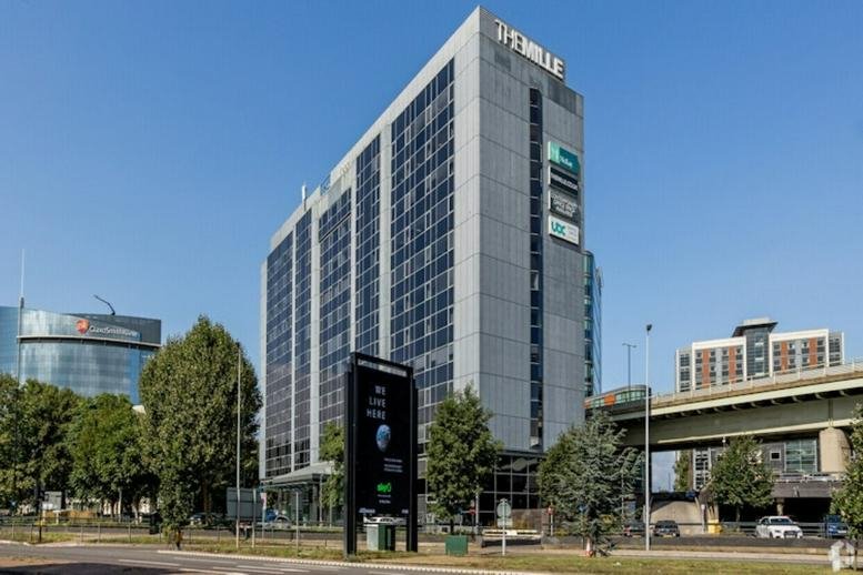 Exterior view of the multi-story glass and concrete building at 1000 Great West Road.