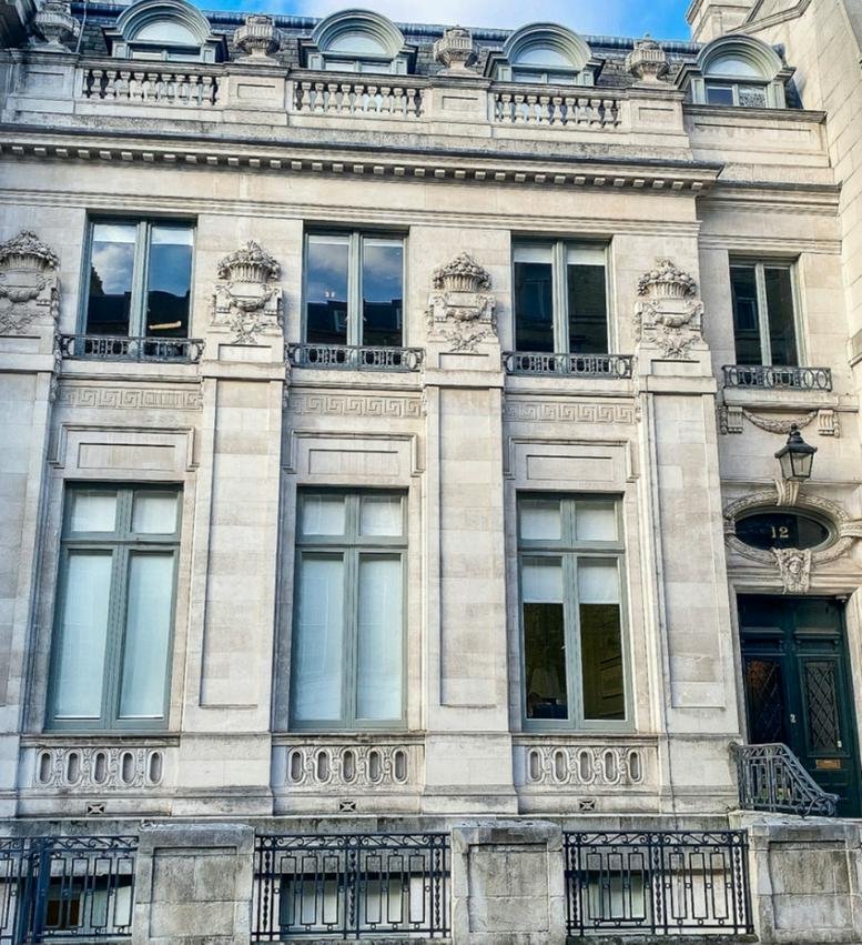 Exterior view of the building with ornate architectural details.