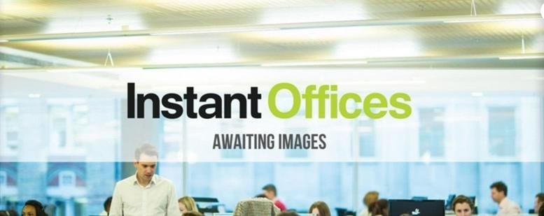 Placeholder image for 154-160 Fleet Street with people working in a bright, modern open-plan office setting.