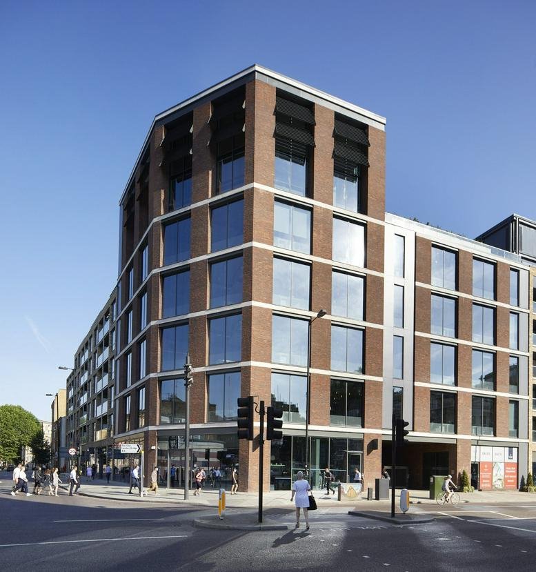 Modern brick and glass exterior of 180 Borough High Street, Central London on a clear day.