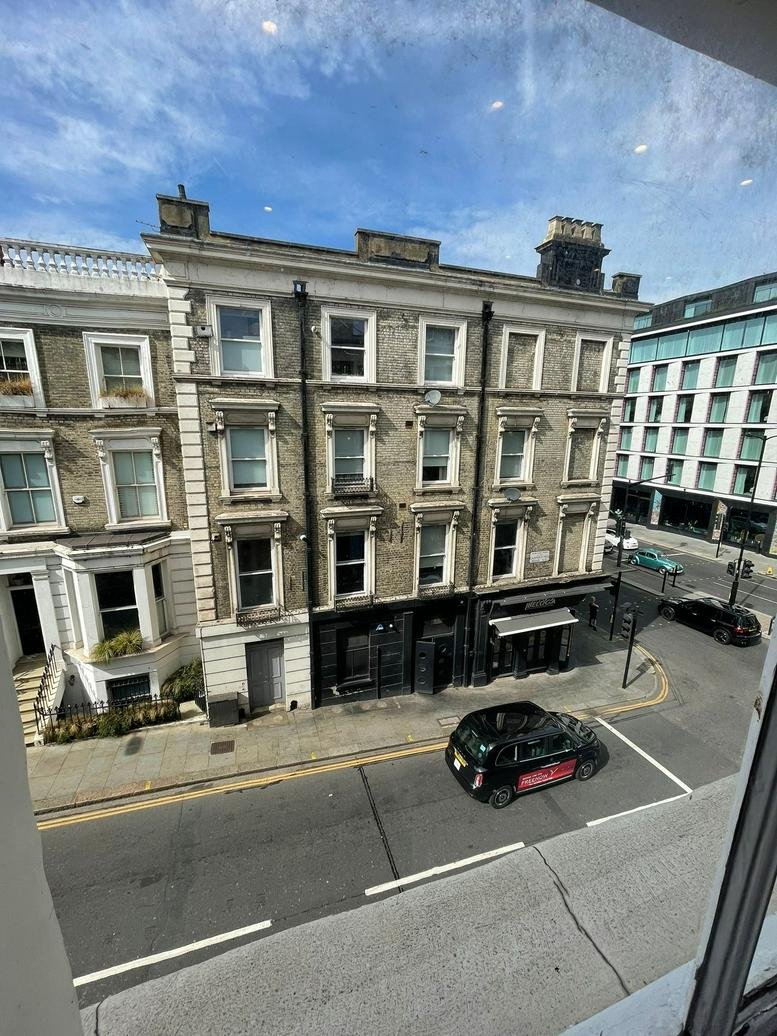Classic brick exterior of 192-196 Campden Hill Road, Notting Hill, London.