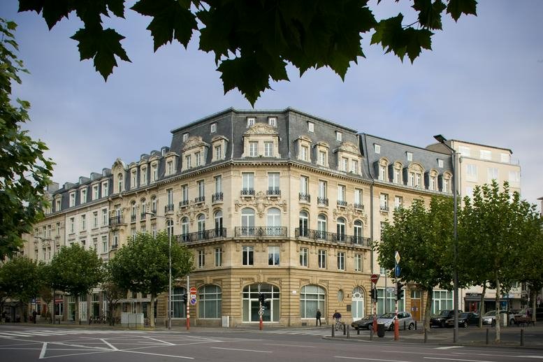Exterior view of the ornate Haussmann-style building at 2 Place de Paris, Luxembourg City.