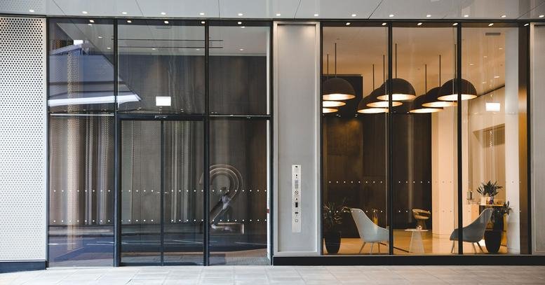 Ground floor glass entrance and lobby at 2 Stephen Street, Central London.
