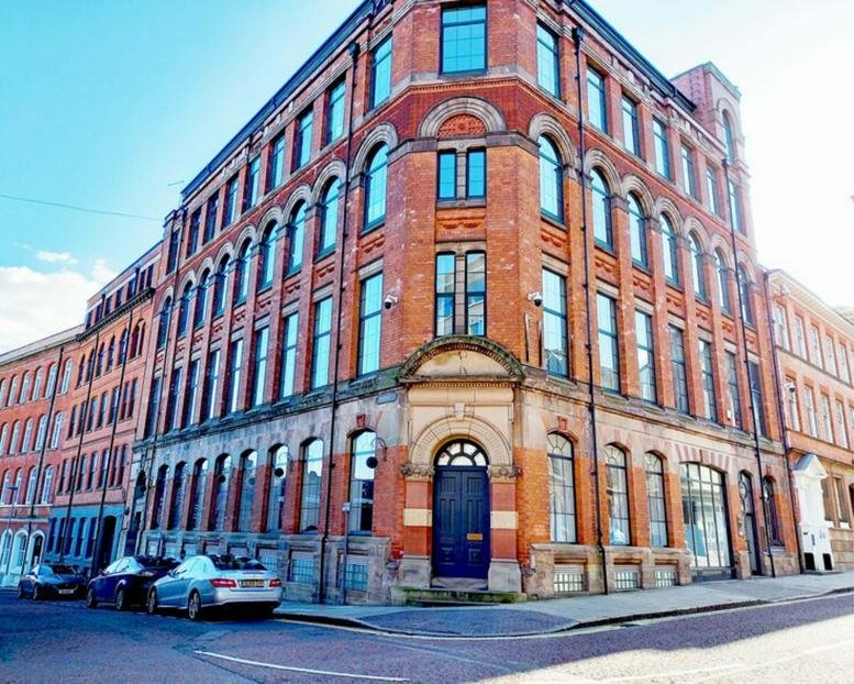 Exterior view of the historic red brick building at 21-23 Castle Gate, Nottingham.
