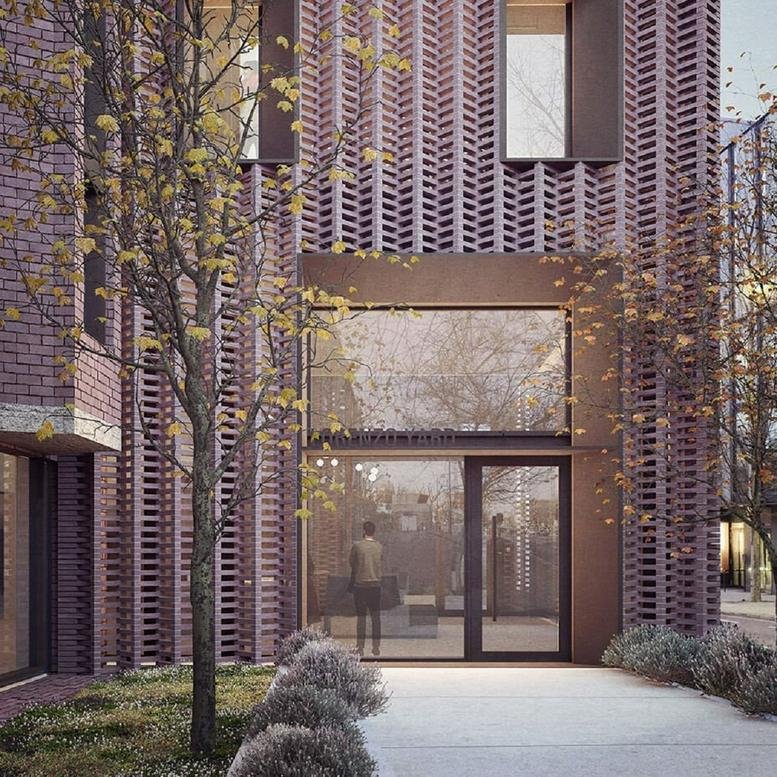 Exterior view of the patterned brick facade and entrance at York House, 221 Pentonville Road.