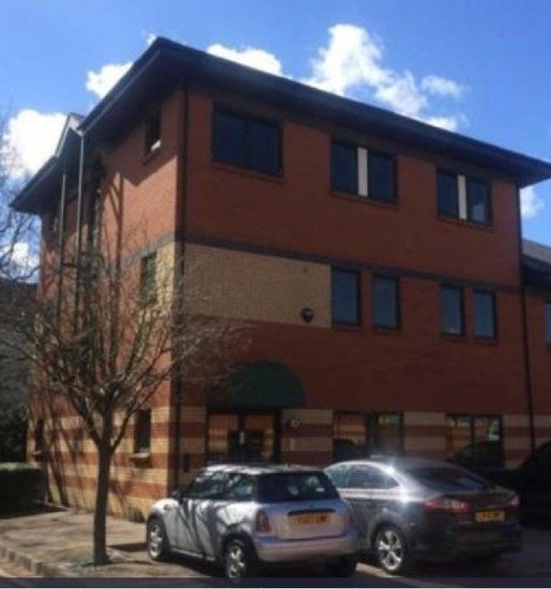 Exterior view of the brick facade at 24 Apex Court.