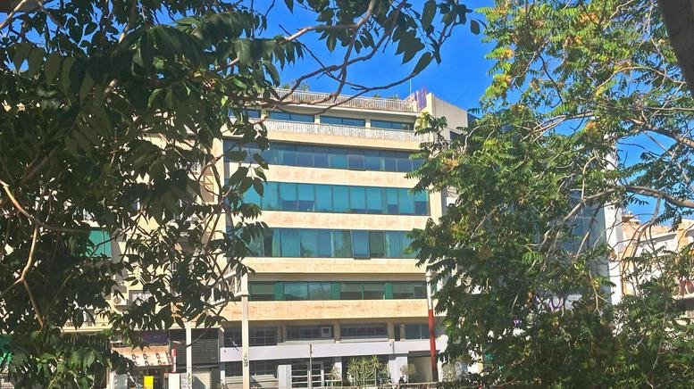 Exterior view of the multi-story professional building at 24 Lagoumitzi Avenue.