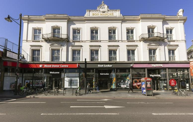 Exterior view of the ornate white facade of 241/251 Ferndale Road.