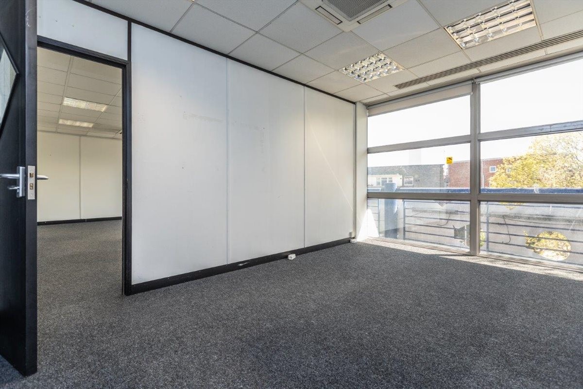 Spacious and bright open-plan office area at 248, 250 York Road with large windows.