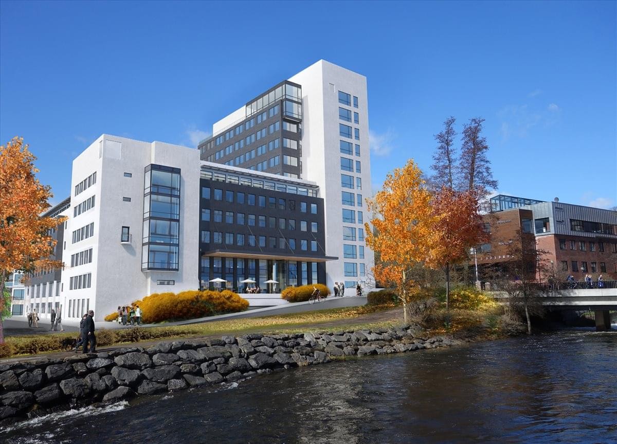 Exterior view of the white and black facade of 28 Nydalsveien at Nydalen Business Park.