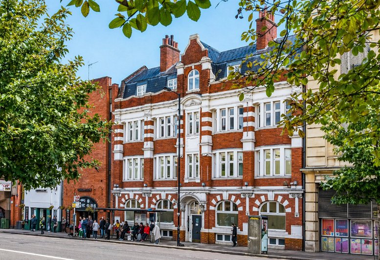Exterior view of the historic brick facade of Mainyard Studios, 280 Mare Street.