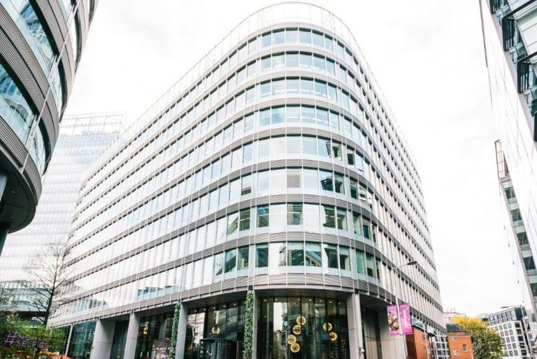 Exterior view of the curved glass facade at 3 Hardman Square, Spinningfields.