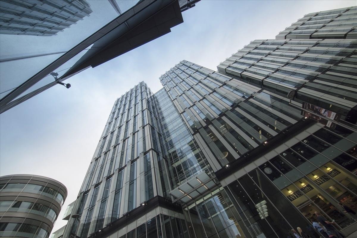 Exterior view of the modern glass facade at 3 Hardman Street.