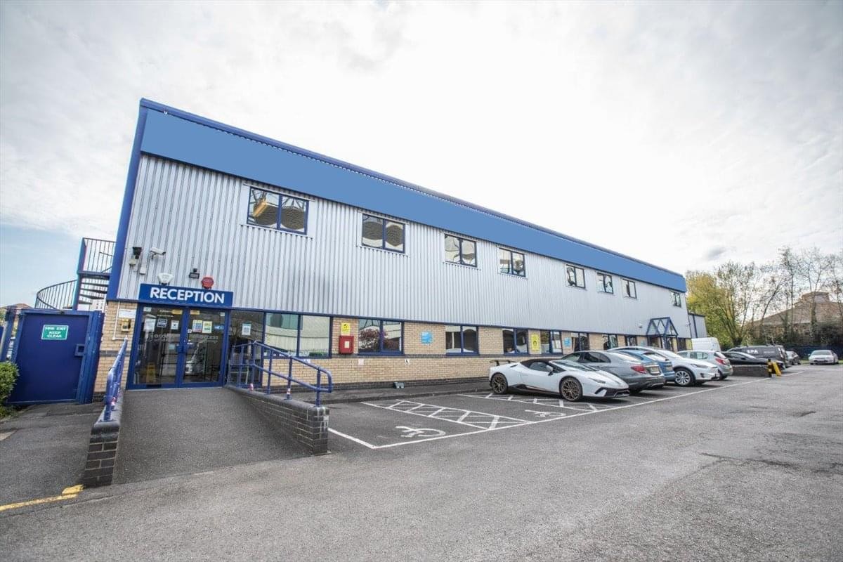 Exterior view of the blue and white industrial building at 30 Rugby Road, Twickenham, Middlesex.