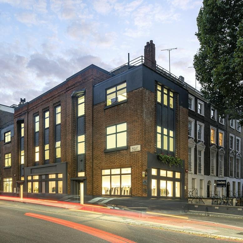 Exterior view of the brick building at 338 City Road with its eye-catching Art Deco facade.