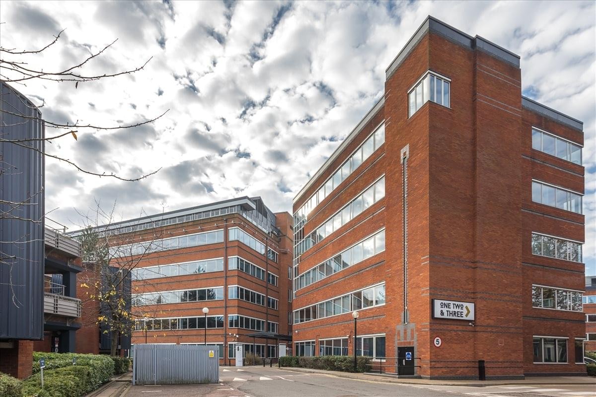 Exterior view of the multi-story red brick office buildings at 4 Imperial Place.