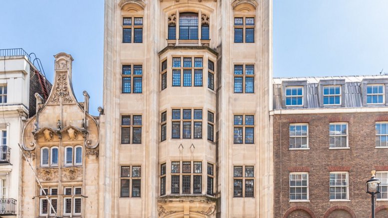 Grand stone facade of the historic building at 41 Whitehall, Trafalgar Square.