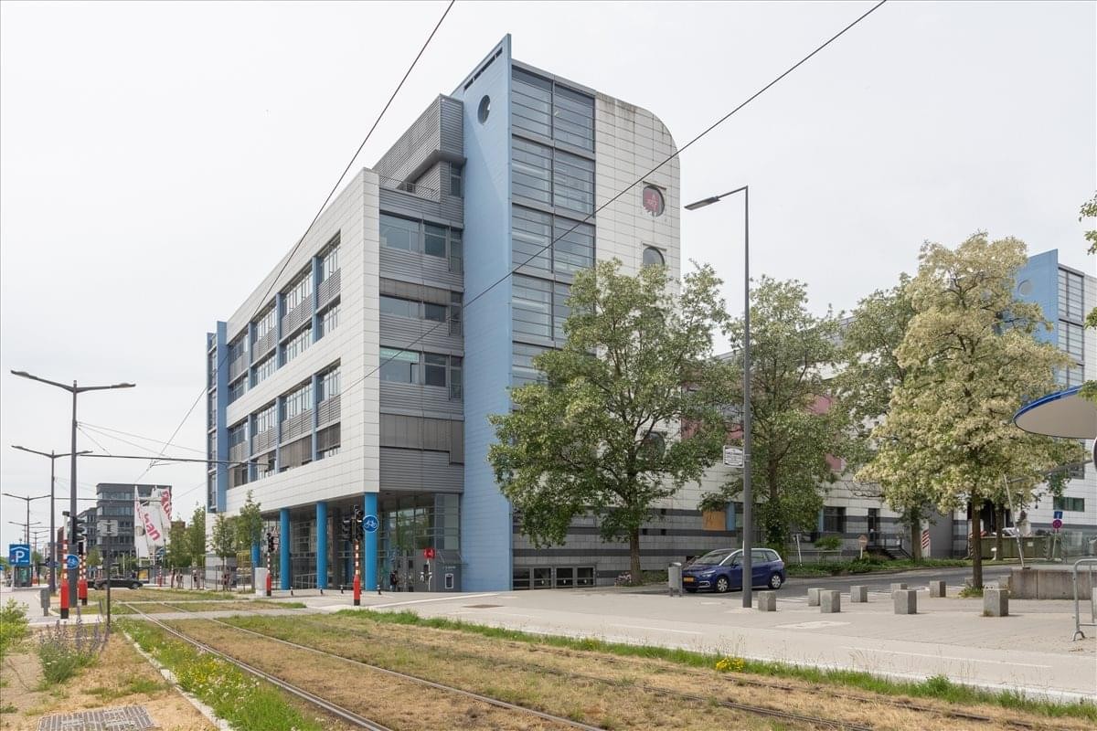 Exterior view of the contemporary blue and grey building at 43 Avenue John F. Kennedy, Luxembourg.