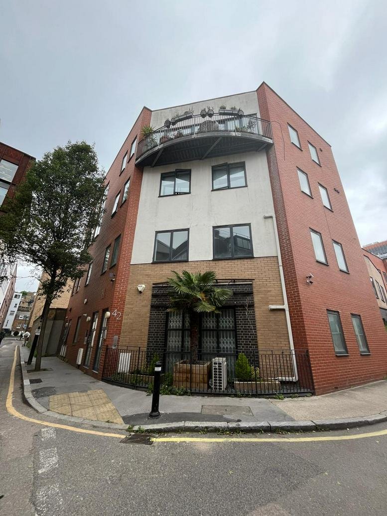 Exterior view of the brick facade and entrance at 44 Copperfield Street, South Bank, Southwark, London.