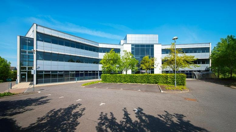 Exterior view of the modern glass and white facade of Hermiston Quay, 5 Cultins Road.