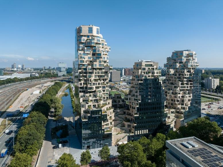 Exterior view of the uniquely tiered stone and glass facade of Valley, Beethovenstraat 505.