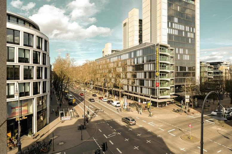 Exterior view of the contemporary mixed-use building at Hohenzollernring 57, Friesenplatz, Innenstadt, Cologne.