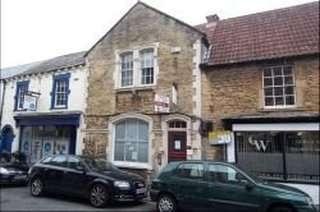 Exterior view of the stone facade office at 6 King Street, Frome, Somerset featuring traditional windows.